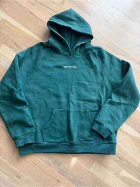 Deep Green Pullover Hoodie with Subtle Chest Logo